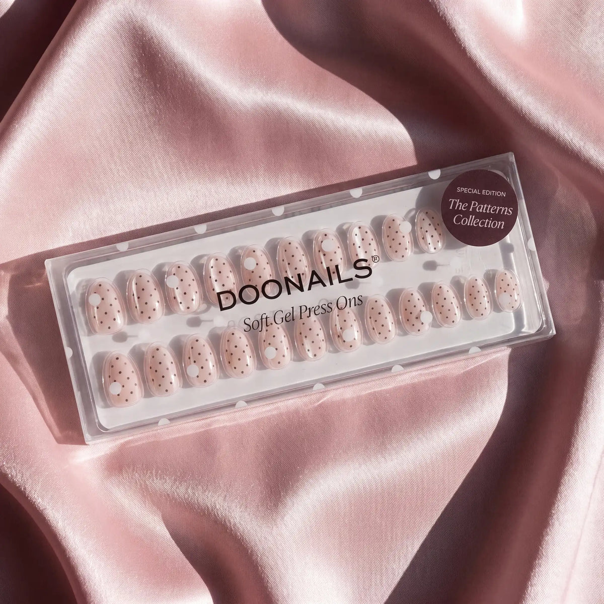 <div class="metafield-rich_text_field"><h2>Powder Pink Cat Eye</h2><p>Brown dots on a shimmering base</p></div>