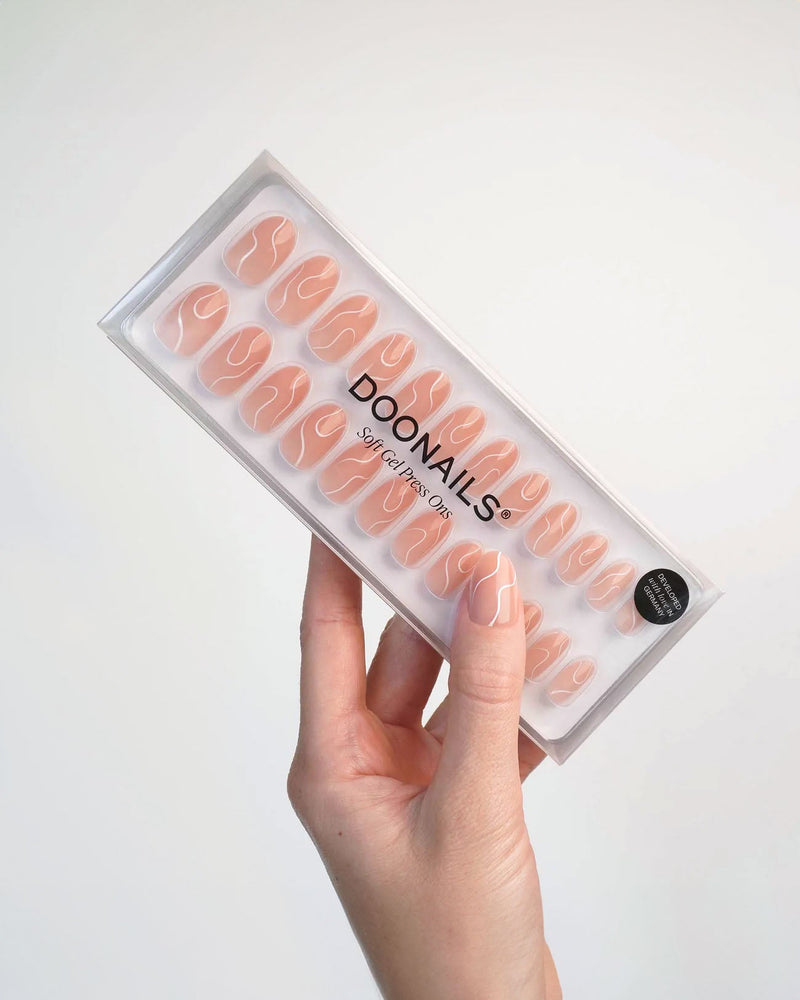 White Swirl Medium Round Soft Gel Press Ons - Doonails US